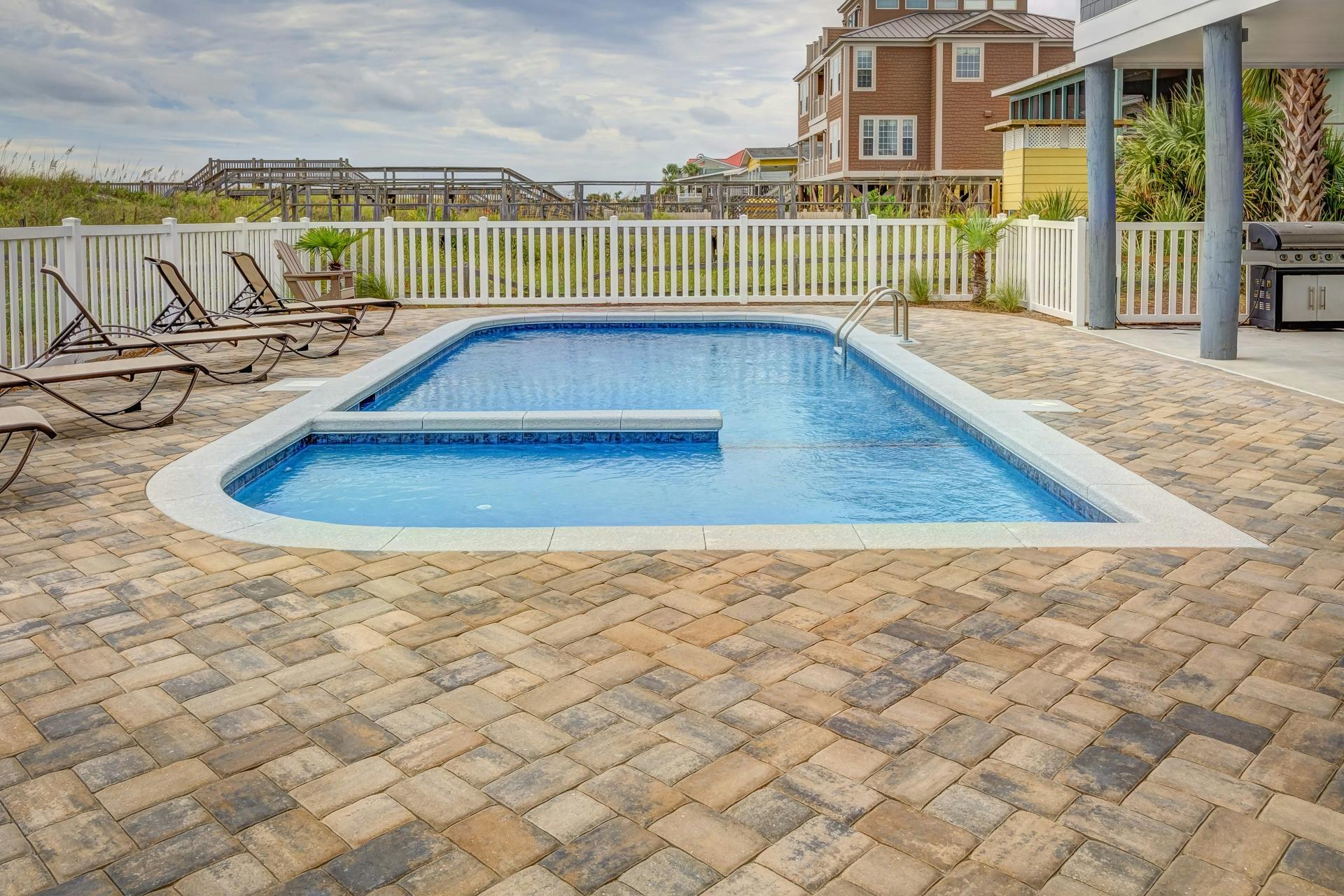 Pool surround spray paving Canberra